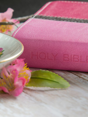 Pink bible with flowers
